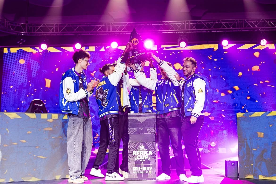 ParadoX Gaming players lifting the Carry1st Africa Cup trophy on stage
